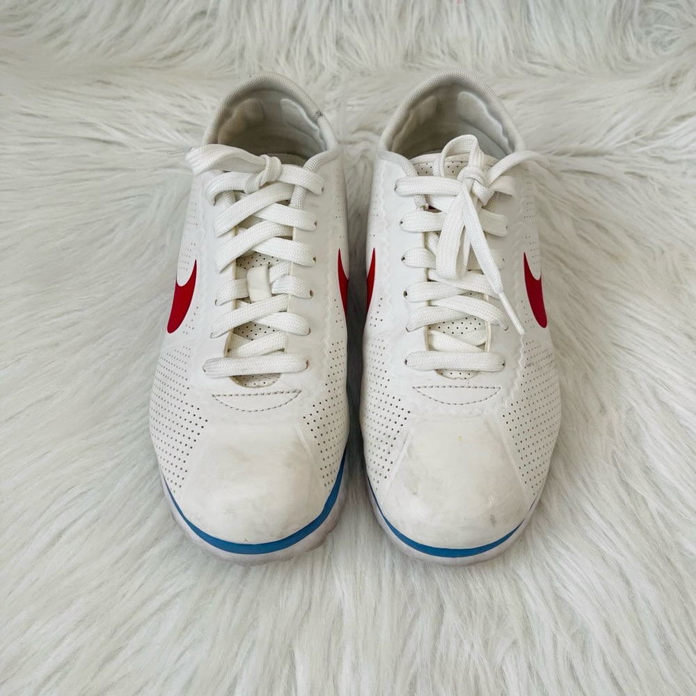 White Sneakers with Red Swoosh